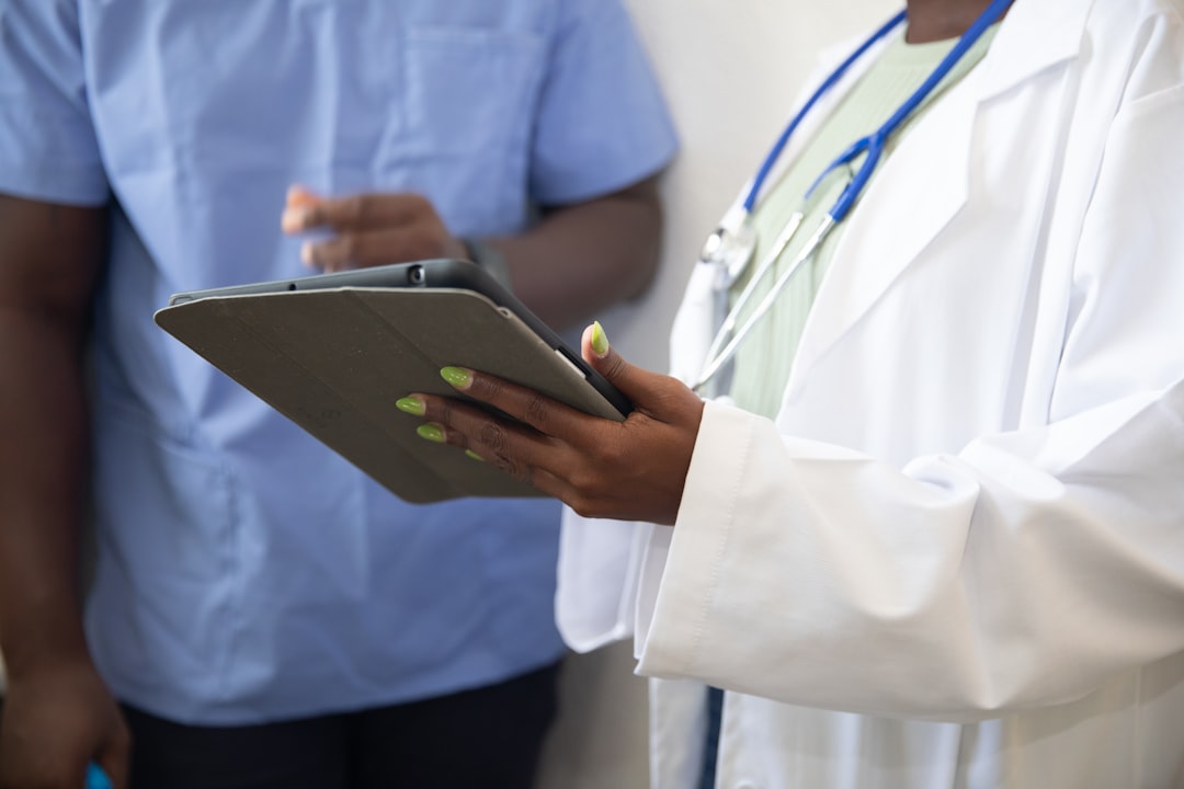 Crafting Captivating Headlines: Your awesome post title goes here a-doctor-showing-a-patient-something-on-the-tablet-j5utvrgse7q