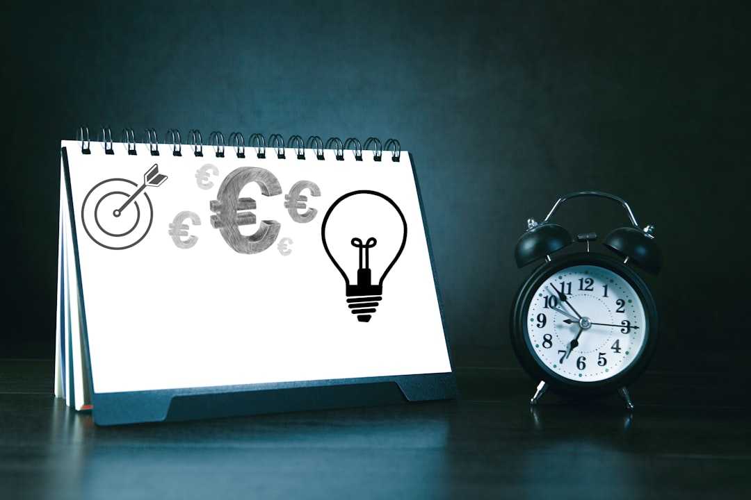 Time is money concept, Alarm clock with light bulb and euro sign